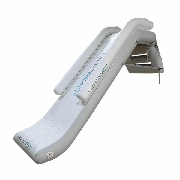 Inflatable water slide with 'Yacht Beach' branding on a white background