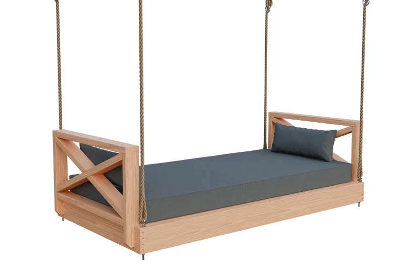 Close-up 3D rendering of a wooden swing with a dark gray cushion and pillow, suspended by thick ropes, against a transparent background