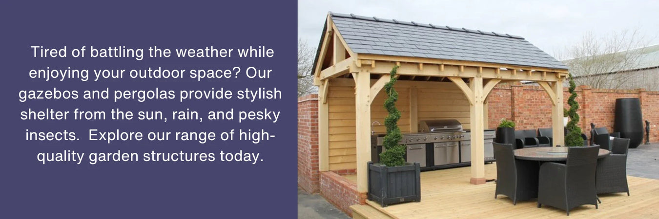 A wooden gazebo with a sloped roof and a brick wall behind it. The gazebo has a barbecue grill and a dining table with chairs underneath it. There are potted plants and trees around the gazebo.