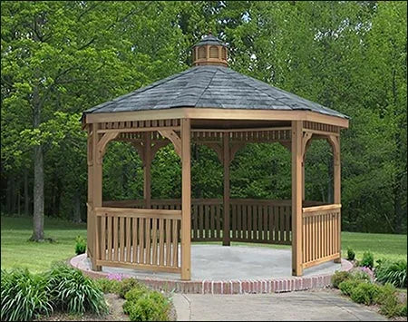 A large octagonal gazebo with a shingled roof, surrounded by greenery.