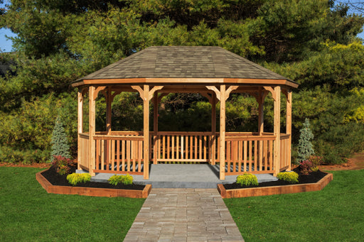 A wooden octagonal gazebo with a gently sloping roof. The gazebo has open sides and a decorative roofline.