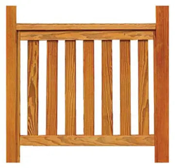 A wooden picket fence panel with vertical slats and a top rail.