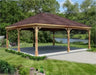 20ft x 20ft cedar wood ramada structure with a gabled roof and a concrete base. The ramada is surrounded by lush greenery and a lake is visible in the background.