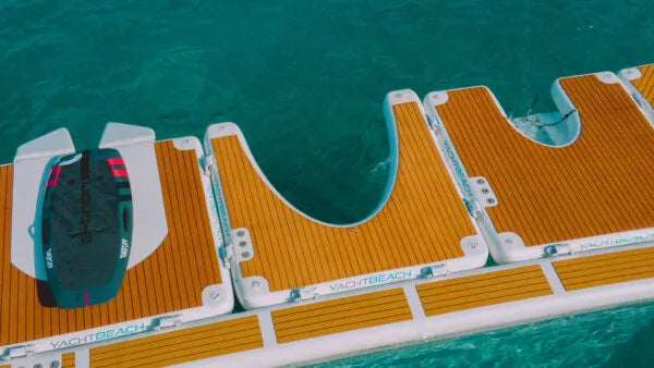 Yacht beach dock system in a body of water