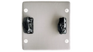 Metallic light switch plate with two black rocker switches on a white background