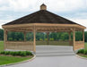 A large, octagonal wooden gazebo with a shingled roof and a decorative cupola. The gazebo features intricate latticework detailing on the walls and roofline, with a spacious interior and a surrounding deck.