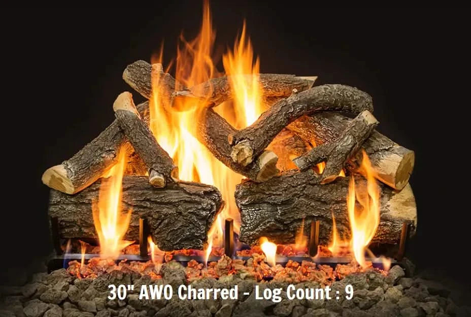 30inch arizona weathered oak charred grand canyon gas logs burning on a burner and a bed of fire rocks. yellow and orange flames are coming out from fire pit