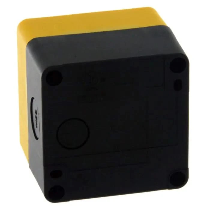 A black and yellow plastic box with a clear plastic lid. The box has a red button on the top and a keyhole on the front.