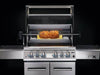 A stainless steel gas grill with a rotisserie kit cooking a roast by napoleon grill