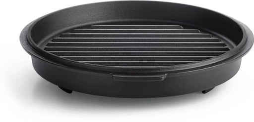 A black cast iron skillet with a raised, ridged bottom for grilling. The skillet has a small handle on one side and three short legs on the bottom. It is sitting on a white background.