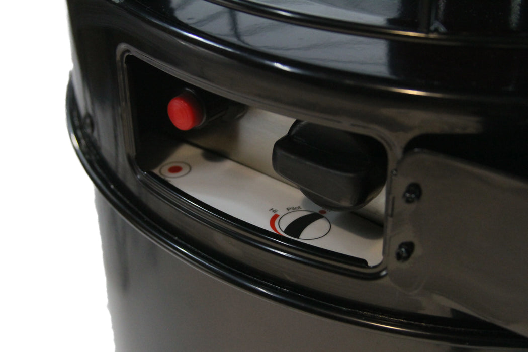 Close-up of the control panel on a black patio heater, showing a red ignition button, a black knob for flame adjustment, and a key slot for added security