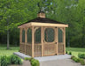 A rectangular, screened 8x8 gazebo with a peaked roof. The gazebo has a wooden frame and screened walls with a door. The gazebo is standing on a concrete pad in a green grassy area with trees in the background.