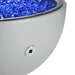 White bowl filled with blue glass beads