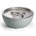 stainless steel torpedo burner on silver concrete gas fire bowl