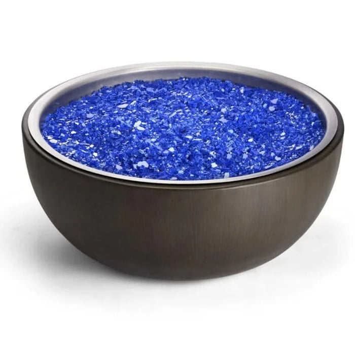 Blue glass decorative rocks in a black ceramic bowl on a white background