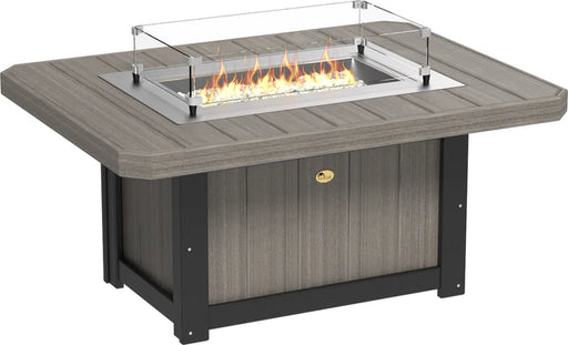 Rectangular poly lumber fire pit table in a weathered gray finish, with a stainless steel burner and a glass wind guard