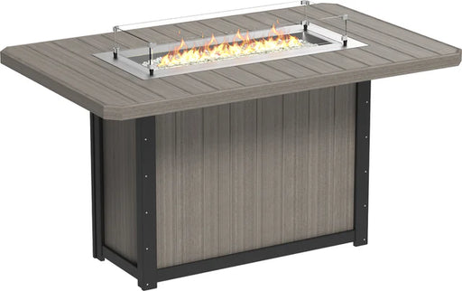 A large rectangular fire pit table with a glass wind guard and a warm, inviting flame.