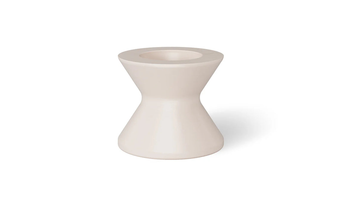 A beige, round poolside table with a wide base and a slightly tapered top.
