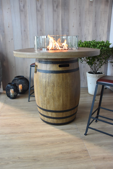 high top bar height fire pit table with stool inside a bar 