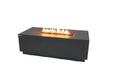 dark grey high performance cast concrete fire table in style andes by elimenti. yellow and orange fire is lit on lava rocks