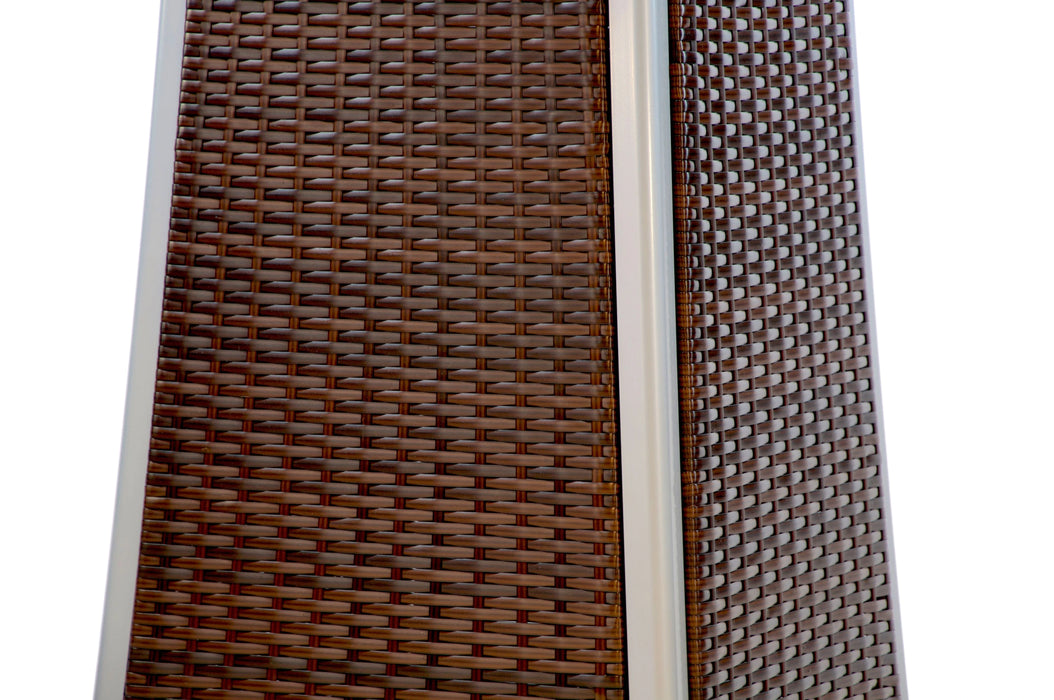 Close-up of the brown woven wicker base of a silver pyramid-shaped propane patio heater, showcasing the intricate weave pattern.