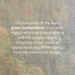 Close-up of green featherstone with text overlay