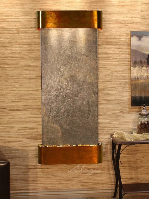 adagio wall mounted water feature with bronze accents in a room setting