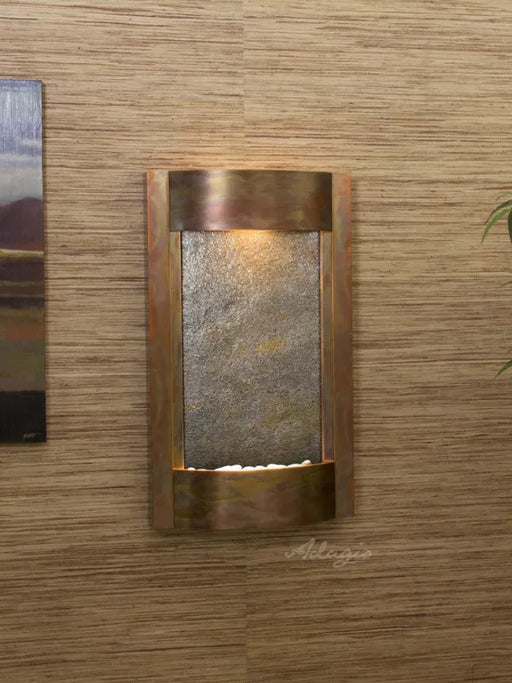 Decorative indoor wall fountain by adagio water features in a beautiful stone finish