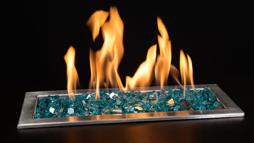 blue reflective fire pit glass burning on fire pit and blowing yellow and orange flames on a black background