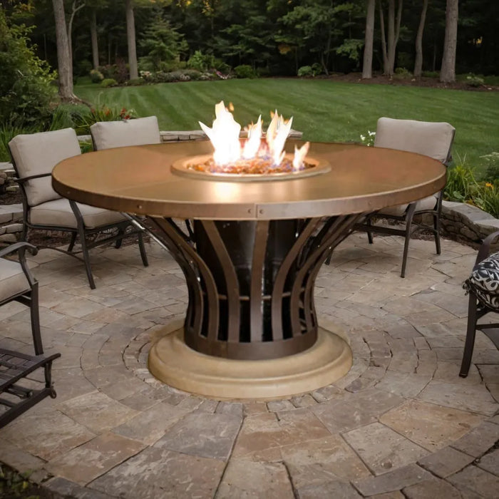 Image showcasing the Fiesta Round Dining Fire Table by American Fyre Designs, creating a welcoming ambiance in an outdoor living space.