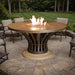 Image showcasing the Fiesta Round Dining Fire Table by American Fyre Designs, creating a welcoming ambiance in an outdoor living space.