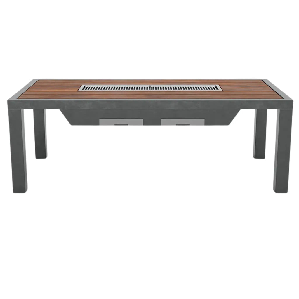 A rectangular outdoor dining table with a wood-slat top and a central built-in grill, supported by dark grey metal legs.