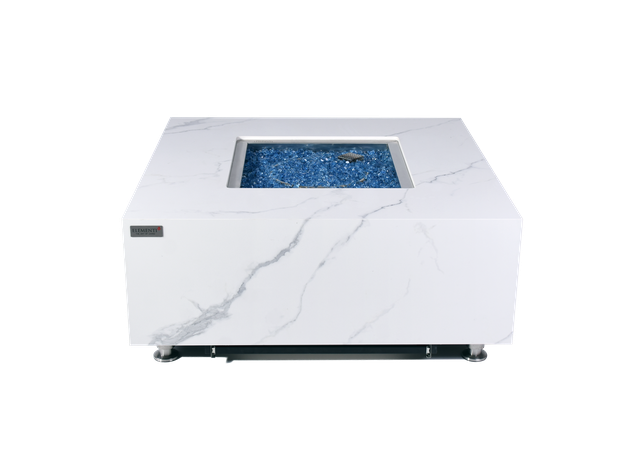 square white marble with black accents on fire table. modern design that uses blue fibre glass in the middle of fire pit to light up fire