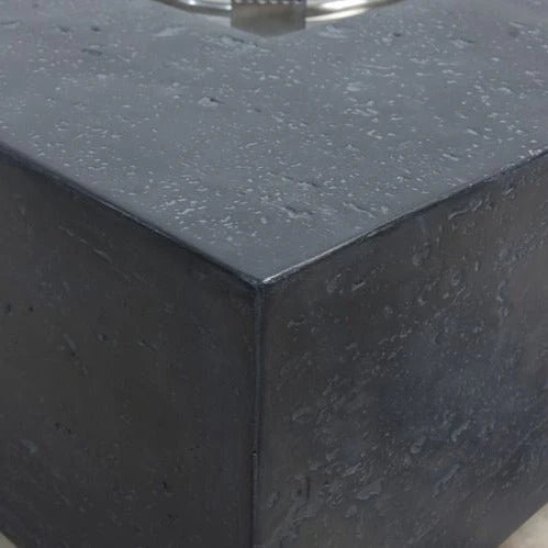 high performance cast concrete close up of texture on dark grey square fire pit table