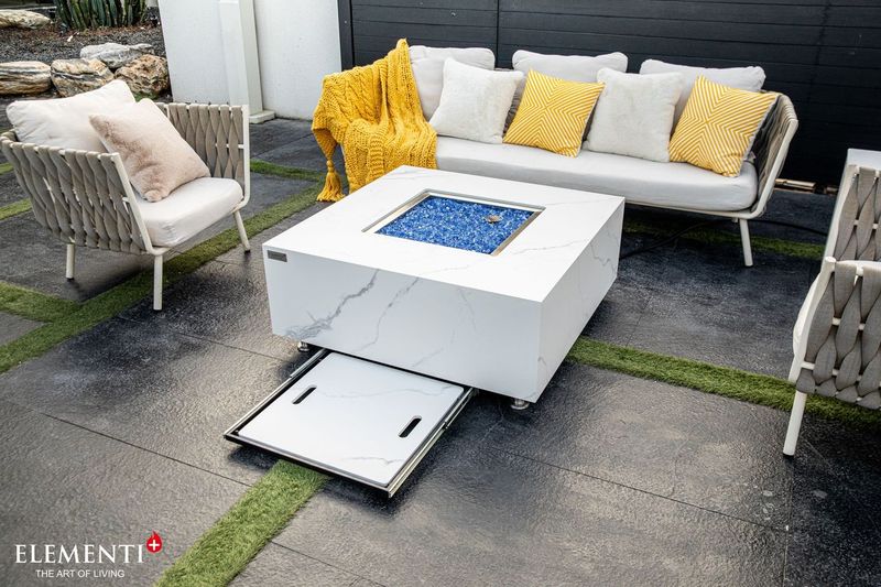 spare white marble fire table with tray in luxury patio or conservative 