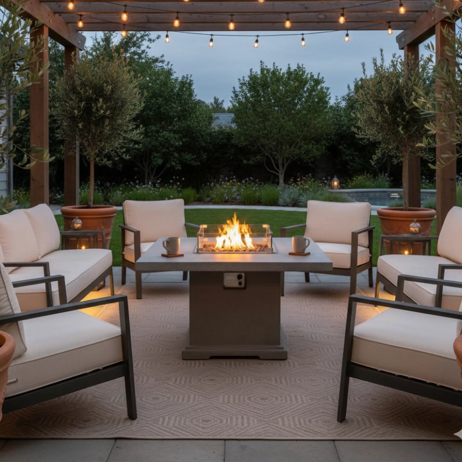 Outdoor patio with elementi birmingham fire pit table and chairs under string lights