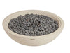 Bowl filled with gray pebbles on a white background