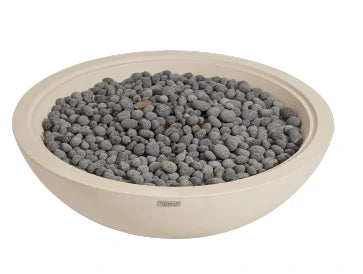 Bowl filled with gray pebbles on a white background