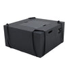 Dark gray square fire pit table with a gray metal cover and black straps securing it.