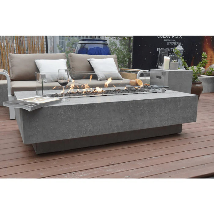 elementi rectangle fire pit table with glass guard in light grey colours and cast concrete material