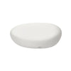 A smooth, cream white coffee table with a rounded, organic pebble-like shape.