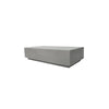 A rectangular coffee table made of GRC (Glass Fiber Reinforced Concrete) in a space gray color, part of the Colorado line.