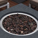 close up of round fire pit in rectangle fire pit table 