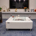 elementi perth ethanol square fire table cream white ECG02CW with windscreen in hotel lobby