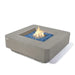 elementi square propane fire pit table with fire pit lit on blue fire glass on a white background