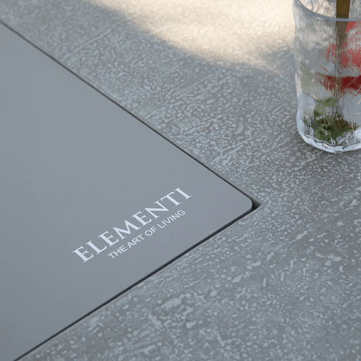 elementi logo on rectangular fire pit close up