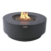 elementi plus nimes round fire pit table OFG414DGis lit on fire glass with yellow and orange flames