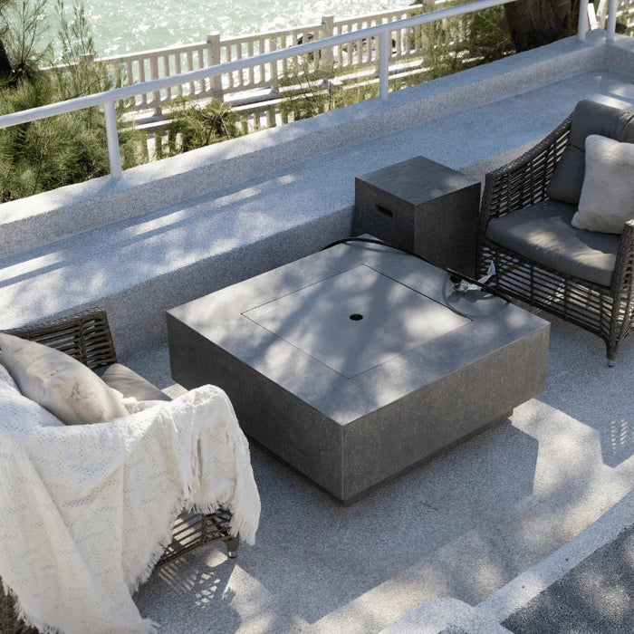 square fire pit table with lid on outdoor patio setting