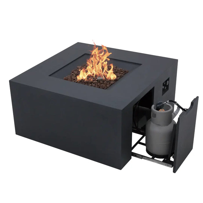 Dark gray square fire pit table with flames and lava rocks, open door showing propane tank storage with a gray propane tank.