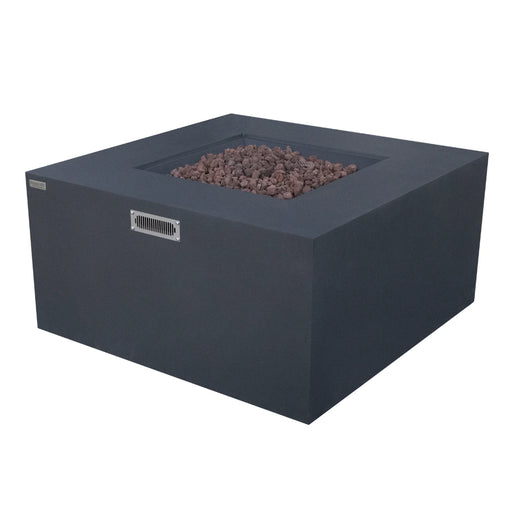 Modern dark gray square fire pit table with a metal vent on the side and lava rocks in the center.